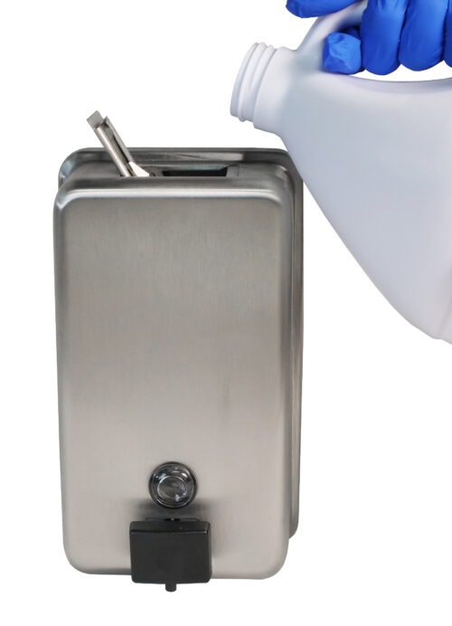 Bobrick B-2111 soap dispenser being refilled with liquid soap